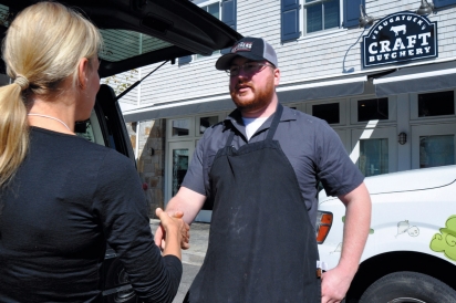Volunteer food runner Danielle Teplica picking up from Naugatuck Craft Butchery in Westport