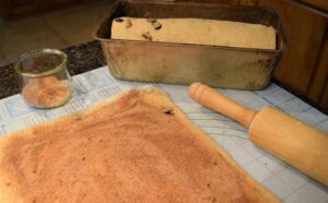 ROLLING THE DOUGH.jpeg